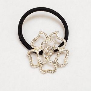 Floral crystal pony tail holder